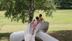 VUILD's 3D-printed slide loops like moebius strip for intuitive play in japan park