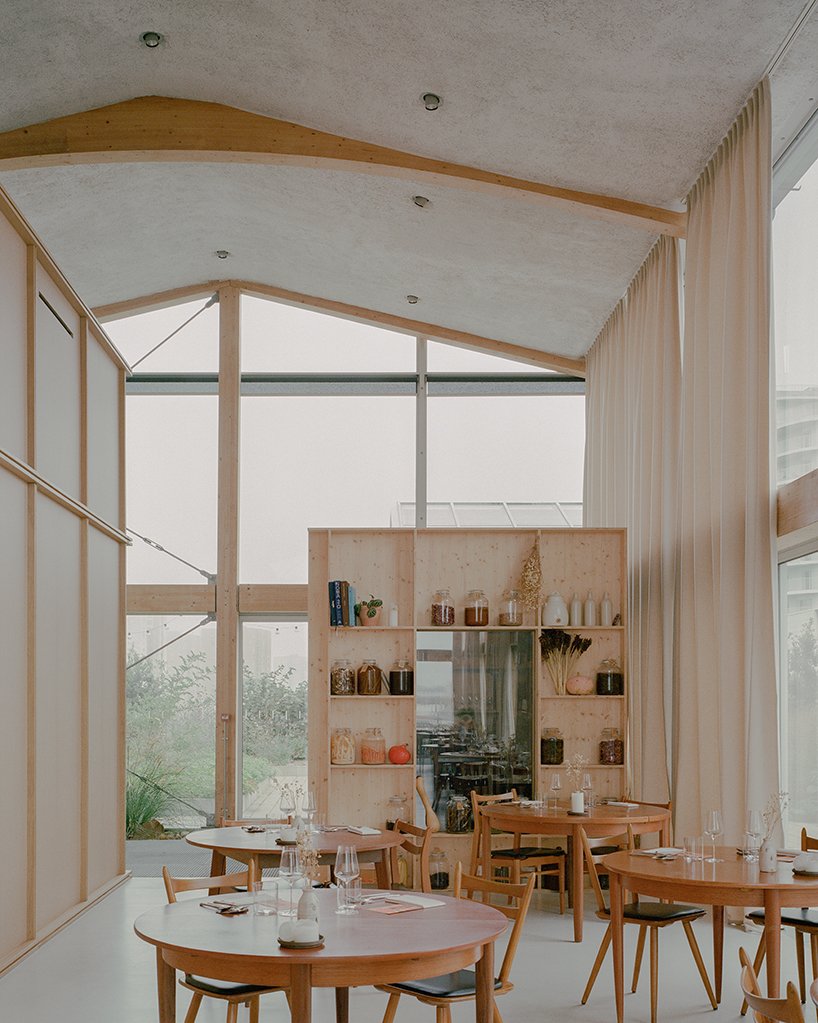 freia rooftop restaurant by raum integrates urban garden within greenhouse in nantes